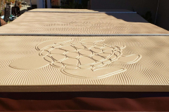 4-piece-swim-spa-with-tan-turtle-and-waves-background-scaled